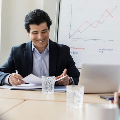 compliance system professional at work in meeting